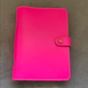 Filofax Personal Size agenda. Color is Fluoro Pink